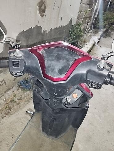 12 volt adapter: Demeli moped on hisseden qeza olunub yanlarında ciziglar var — 9