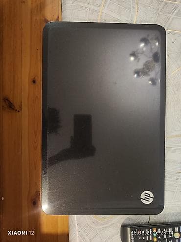 iphone 11 100$: HP noutbuk - Brend: HP - Korpus: qara rəng, parlaq qapaq, HP loqosu - — 1