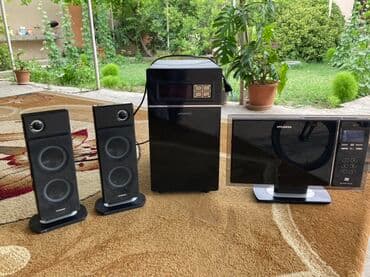 Hyundai-dən qara rəngli, müasir dizaynlı musiqi mərkəzi. İki ədəd