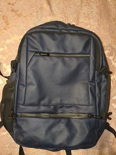 Davamlı materialdan hazırlanmış çoxfunksiyalı şəhər/iş məktəb çantası
