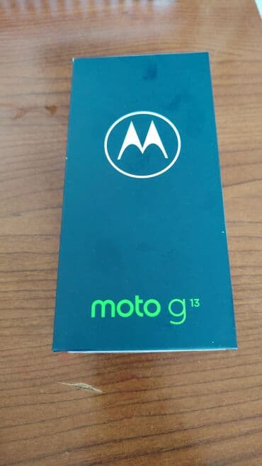 радиостанция motorola: Motorola Moto G13, 128 ГБ, цвет - Голубой, Сенсорный, Отпечаток пальца, Две SIM карты — 4