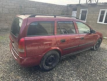Opel: Opel Astra Caravan (Universal), qırmızı gövdə yalnız kredetlə — 10