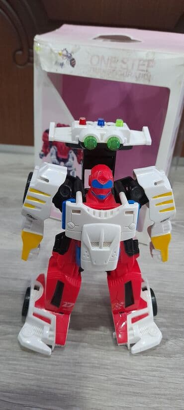 oyuncaq buldozerlər: Az islenmis hen robot hem masin,musiqili duymeleri var . 15man — 5