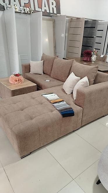 2 reqem tortu: Kunc divan satilir 600azn. Yenidir. Magaza baglandigi ucun satilir — 1