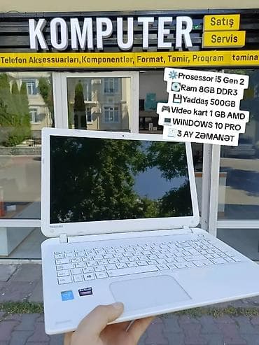 Ağ korpuslu, tam klaviatura və geniş touchpad. Gündəlik iş, ofis