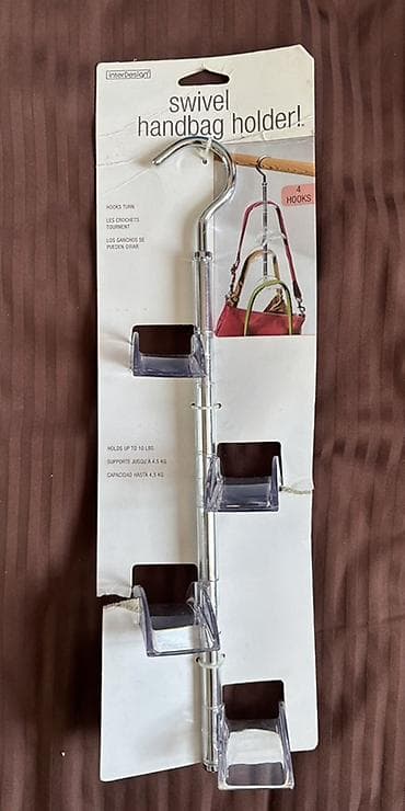 asilqanlar: InterDesign Swivel Handbag Holder – çantaları və aksesuarların — 1