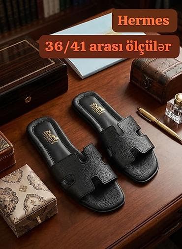 dəri plaş: Hermes qadın şlapanları – ikonik “H” kəsimli model. - Rənglər: qara və — 1