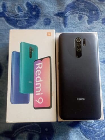xiaomi 12s ultra qiyməti: Redmi 9 smartfonu, qara rəngdə, öz qutusunda və sənədləri ilə təqdim — 4
