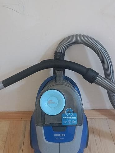 çəki daş: Philips 2000 Series tozsoran - Güclü sovurma: cihaz üzərindəki “High — 1