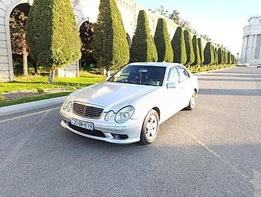 mersedes spoyler: Mercedes-Benz E-Class sedan (W211), gümüşü rəng. Xüsusiyyətlər: - — 8