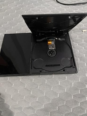 ps2 disk: Sony PlayStation 2 Slim (SCPH-90004) – PAL versiyası Xüsusiyyətlər: - — 3