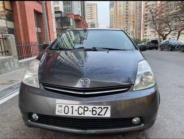 bmw x7 2009: Toyota Prius (2-ci nəsil) hibrid hetçbek - Gümüş-boz rəng (dark — 1