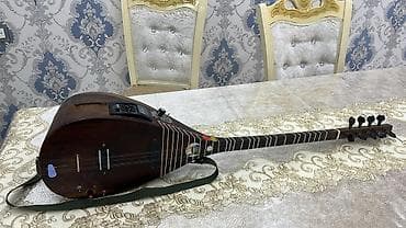 Elektro saz – quraşdırılmış elektronikaya malik professional çalğı