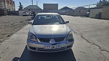 ford focus hatchback: Mitsubishi Lancer: 1.6 l | 2006 il 466000 km Sedan — 3