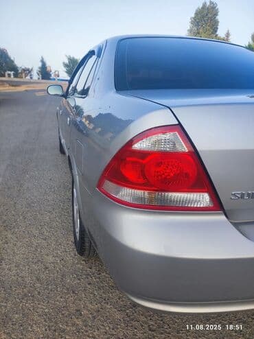 motosiklet telefon tutucu: Nissan Sunny: 1.6 l | 2008 il Sedan — 12