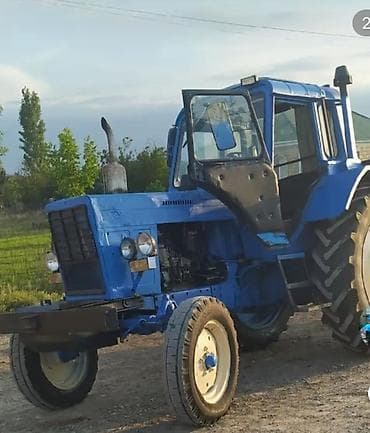 ehtiyyat təkər: Mavi rəngli MTZ tipli təkərli traktor Texniki xüsusiyyətlər: - Dizel — 4