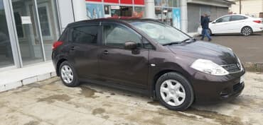 motosiklet telefon tutucu: Nissan Tiida: 1.5 l | 2011 il Hetçbek — 1
