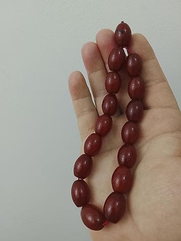 Qədimi Ələ yatqın zoğalı rəngdə kəhrəba təsbehdir