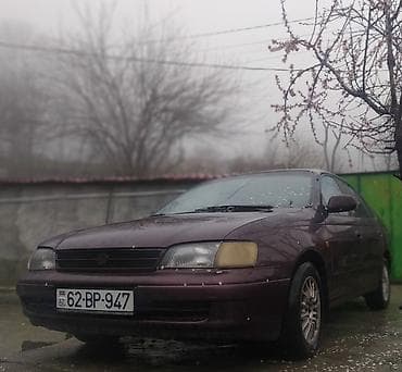 avto rullar: Toyota Carina E: 2 l | 1994 il Sedan — 1