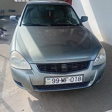 Avtomobil: Sedan, boz rəng Nömrə nişanı: 99-MF-018 (AZ) Kuzov: 4