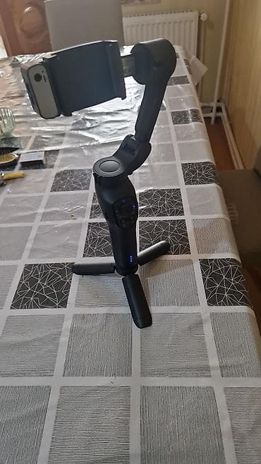 gence telefonlar: Smartfonlar üçün 3 oxlu stabilizator (gimbal) və mini tripoda çevrilən — 2