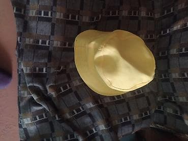 panama: Sarı bucket şapka.Tersinede cevurib geyinmek olur.Diger elaninizda — 2