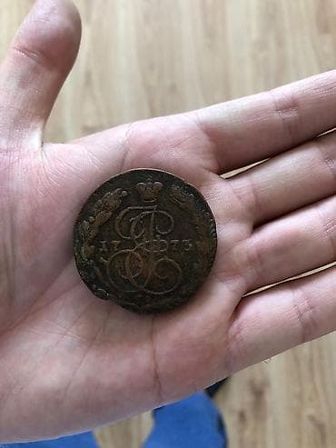 Antik kolleksiya sikkəsi, üzərində 1773 tarixi görünür. Sikkənin bir