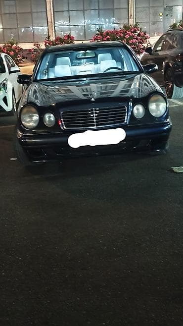 mercedes benz 1992 e200: Mercedes-Benz E-Class W210 sedan - Korpus: 4 qapılı sedan, tünd mavi — 1