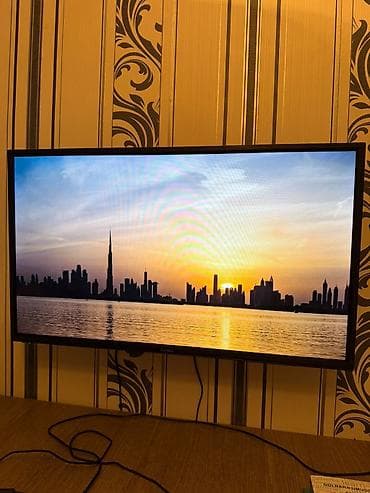 taube televizor: Fis82 diaqonal, Smart tv, full HD, az işlənib, qutusu üstündə, divar — 1