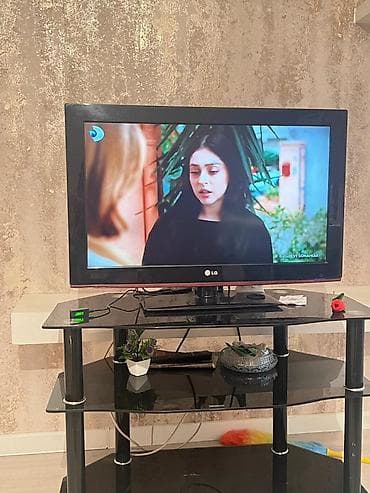 tel ustasi: LG televizor + şüşə TV stolik Məhsulun xüsusiyyətləri: - Brend/model — 1