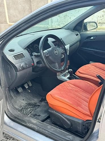 kia servis ehtiyat hisseleri: Opel Astra: 1.4 l | 2009 il 296000 km Hetçbek — 7