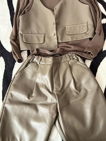 tulku derisi: Qız uşağı üçen – eko dəridən şortik və qolsuz jilet, üstündə incə — 2