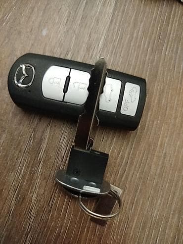 santafe 2012: Mazda smart açar (keyless) – 4 düyməli Xüsusiyyətlər: - Uzaqdan — 2