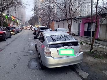 opel vectra a: Toyota Prius, gümüşü rəng, 5 qapılı liftbek. Hibrid benzin-elektrik — 2