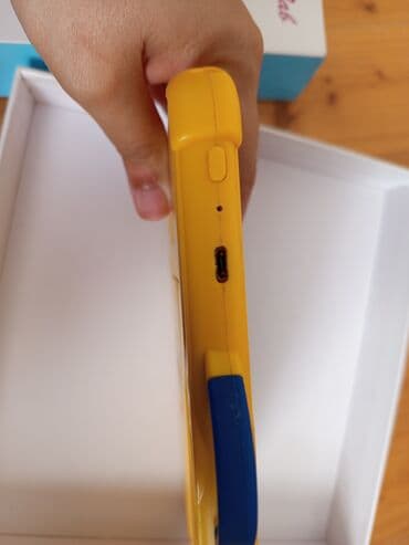 uşaqlar üçün planşetlər: Uşaqlar üçün hazırlanmış bu "Smart Tab" planşet, qoruyucu sarı rəngli — 3