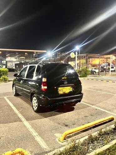 багажник на крышу авто: Hyundai Matrix avtomobili. Qara rəngli bu model, funksional dam — 4