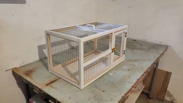 вольер для собак: Ağac və metal torundan hazırlanmış düzbucaqlı qəfəs. Qəfəsin bir — 2