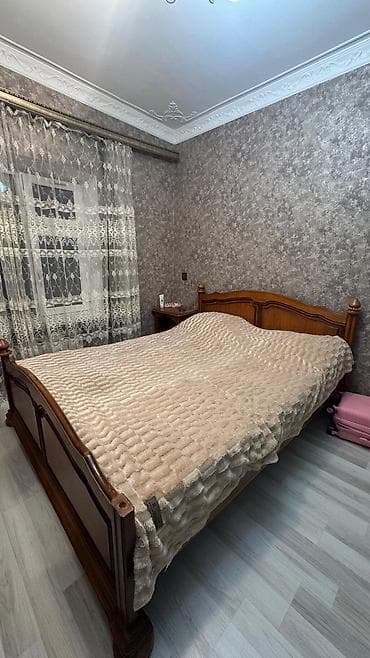 İkinəfərlik çarpayı