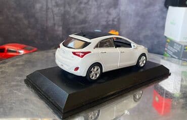maşın modeli: Коллекционная модель Hyundai i30 5 door white 2012 Pino B&D Scale — 17