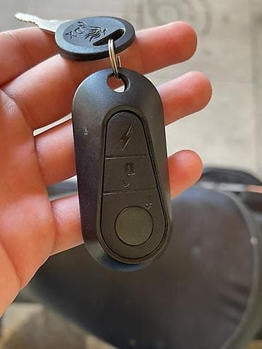 moto m50n: Elektrik skuter – qara rəng, şəhər daxili rahat gediş üçün. Texniki — 6
