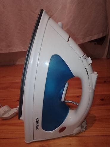 Buxarlı ütü – SOMANS TP-2302 Xüsusiyyətlər: - Buxar funksiyası