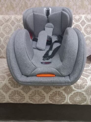 Uşaq avtomobil oturacağı – boz rəng, yumşaq tekstil üzlüklü, yanlardan