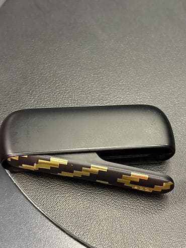 Məhsul: IQOS x Seletti limitli dizayn cihazı (heat‑not‑burn tütün — 3