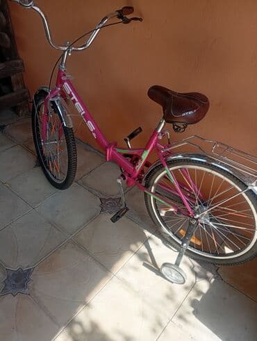 руль для велосипеда: Uşaqlar üçün çəhrayı rəngdə Stels markalı velosiped. Bu model gənc — 5