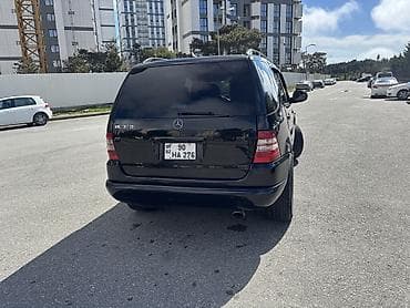 mersedes 190: Mercedes-Benz ML 320: 3.2 l | 2000 il Ofrouder/SUV — 3