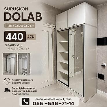 Sürüşkən qapılı dolab. Ölçüləri: 1,38 x 2,60 x 0,60 sm. Açıq rəngli — 1