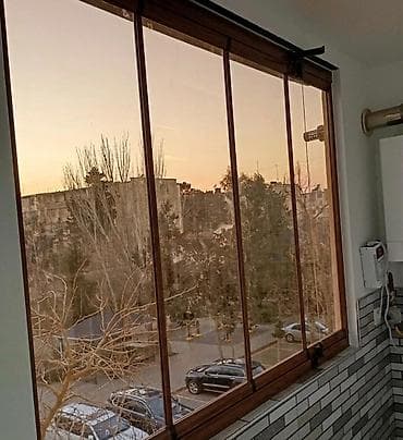 Balkon və teraslar üçün çərçivəsiz sürgülü şüşələmə sistemi - 8–10 mm