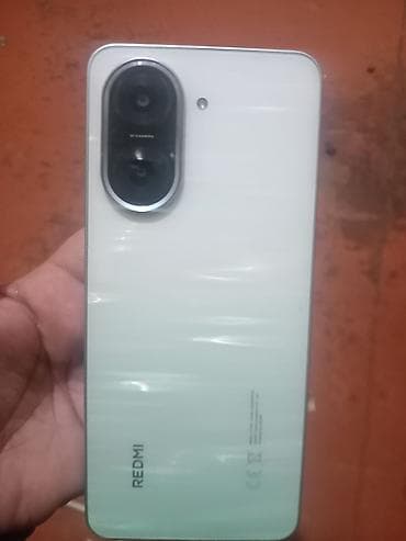 su kondisioner: Smartfon – 128 GB yaddaş, su damcısı formalı ön kamera kəsiyi olan tam — 5