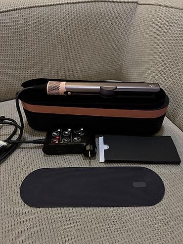 Dyson Airstrait Jasper Plum rengi 2 defe istifade edilib. 999 azn e