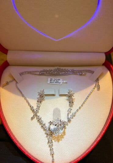 bmw 7 серия 730d at: Dəstə daxildir: Bilərzik, Boyunbağı, Üzük, Ağ qızıl, 585 Əyar, 1352 g — 1